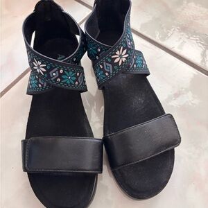 Alegria Black Sandals with Blue Floral Accents